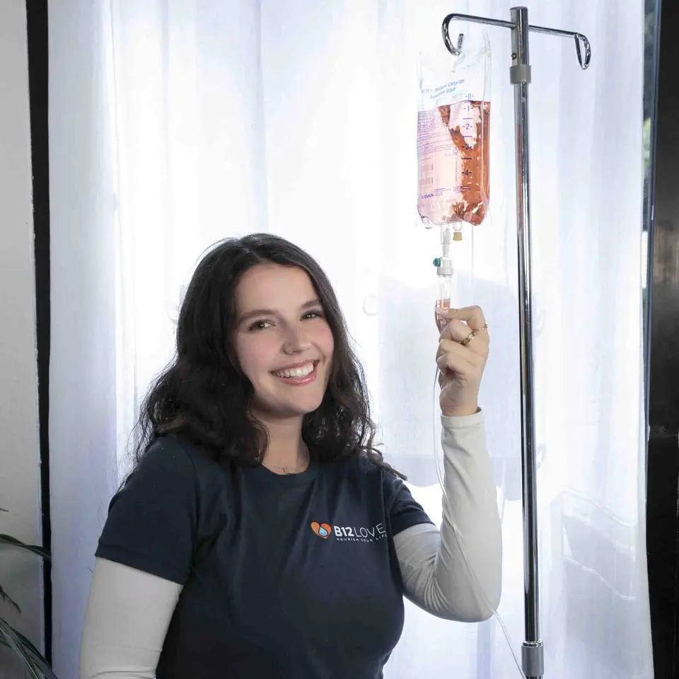 B12 LOVE Embarcadero Center team member holding an IV bag