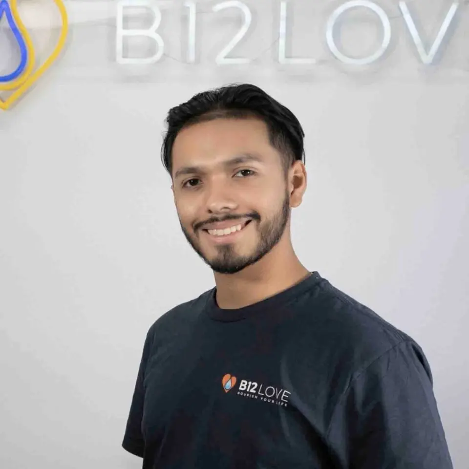 Portrait of a B12 LOVE Greenbrae team member in a branded T-shirt