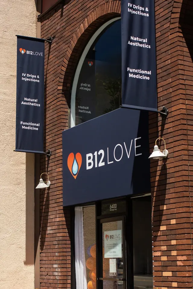 Brick storefront with B12 LOVE awning and banners at 6400 Moraga Ave, Montclair