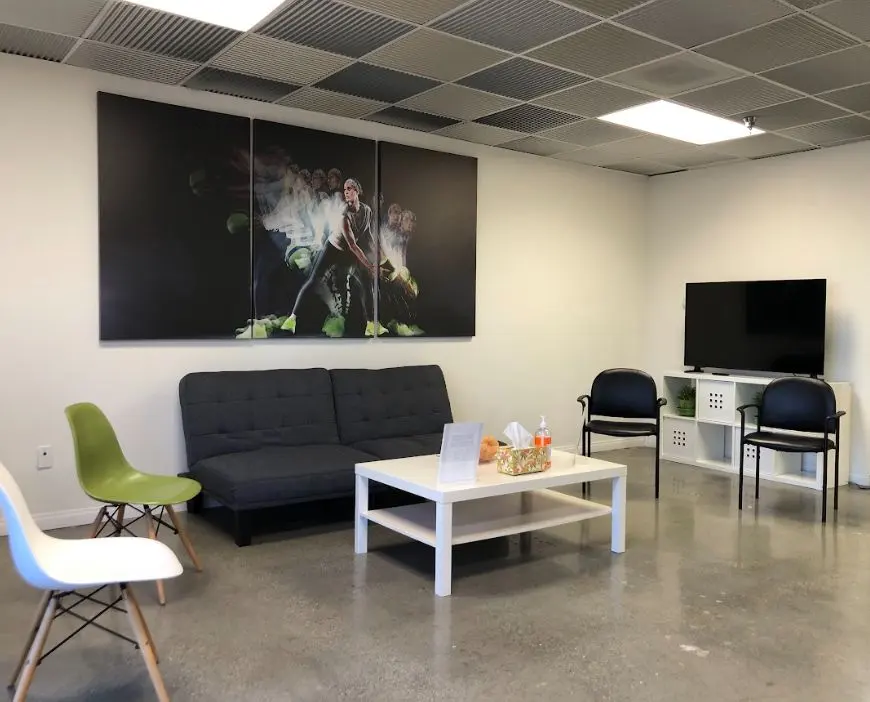 Waiting area with sofa and chairs at BodySpec Culver City