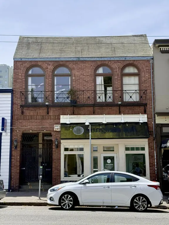 Brick building with BodySpec storefront on Union Street, SF Marina