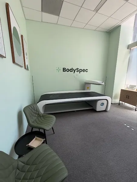 DEXA scanner and seating in the scan room at BodySpec SF Rincon Hill