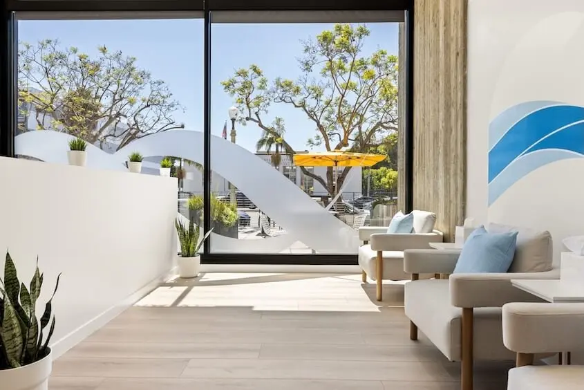 Lounge seating by the front windows at Hydration Room Culver City