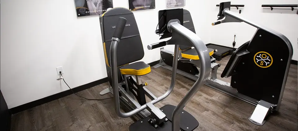 Close view of OsteoStrong resistance machines at OsteoStrong Greenwich