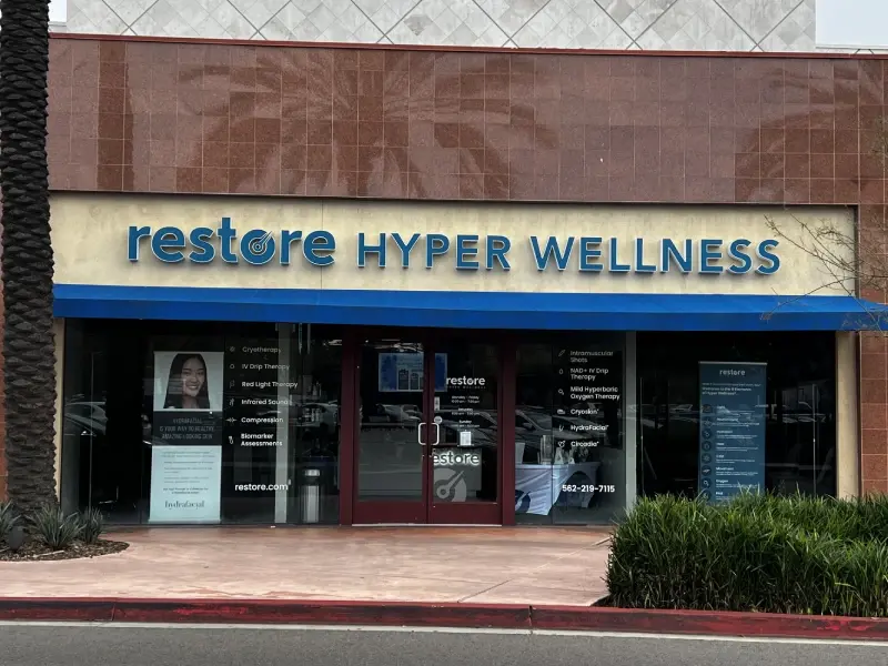 Storefront with Restore Hyper Wellness signage in Cerritos