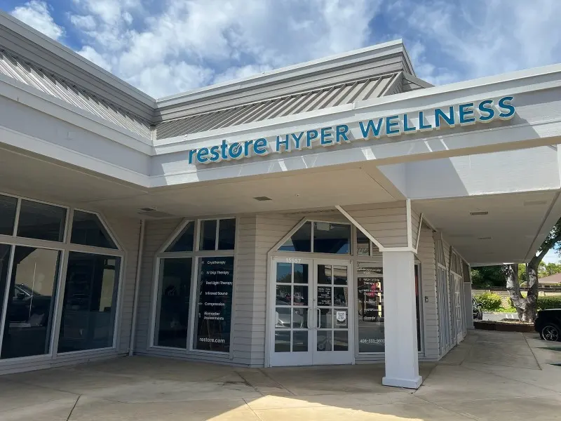 Restore Hyper Wellness signage over the entrance in Los Gatos